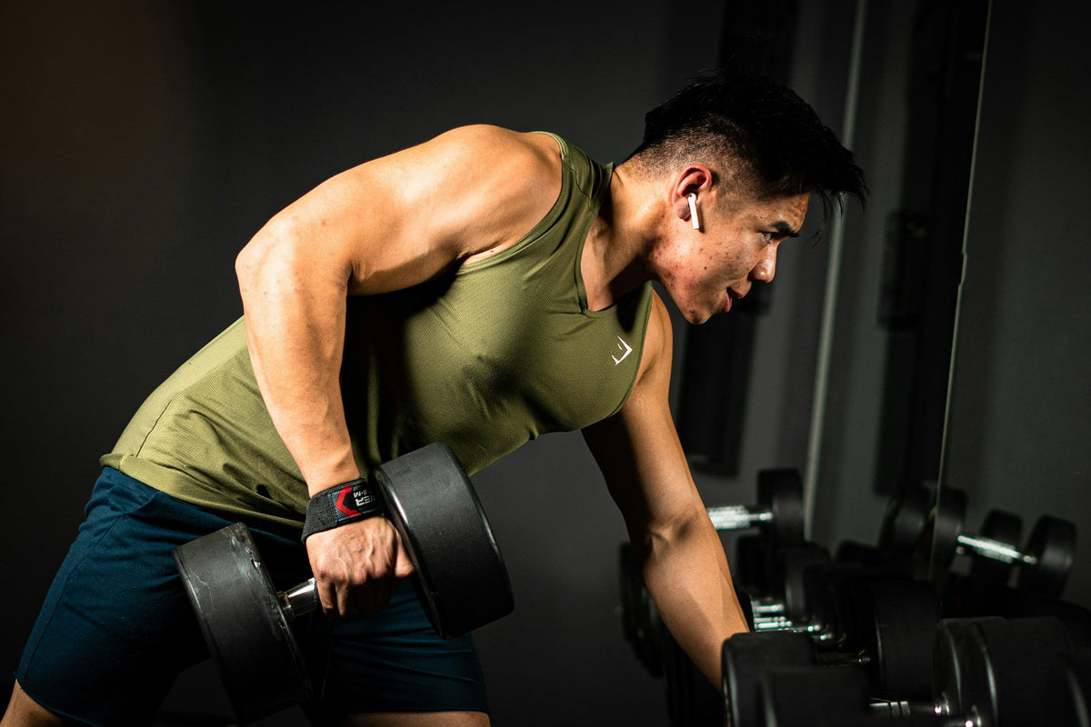 muscular man lifting weights