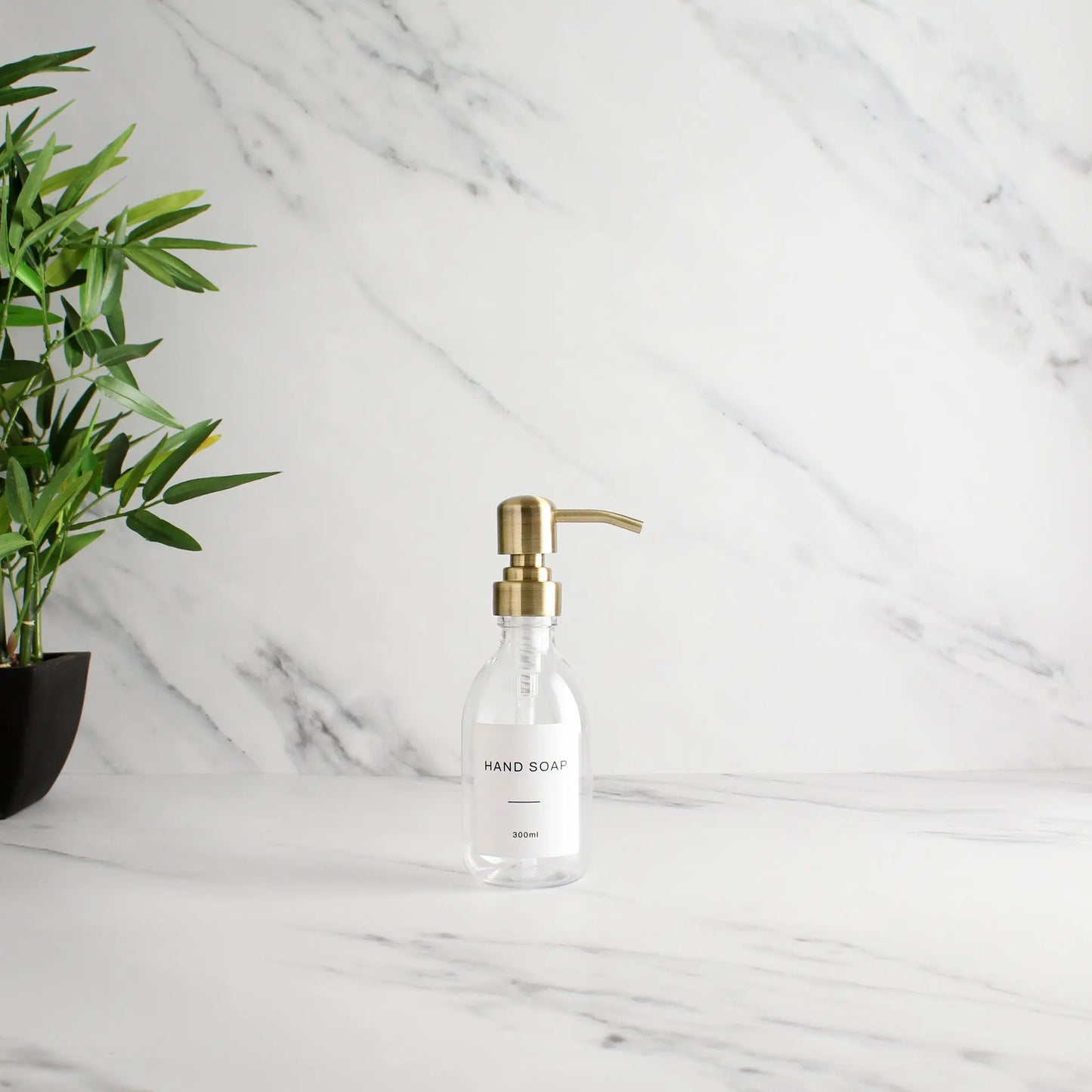 Labelled Clear Plastic Dispenser Bottle With Gold Pump Namie Home