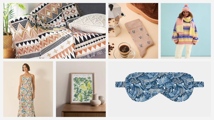 A pile of wrapped Christmas gifts surrounded by fairy lights and tinsel 