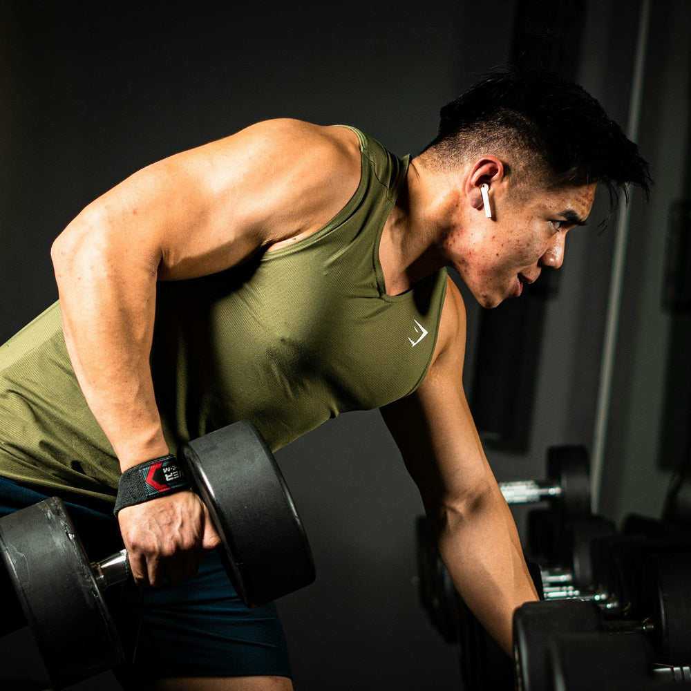 muscular man lifting weights