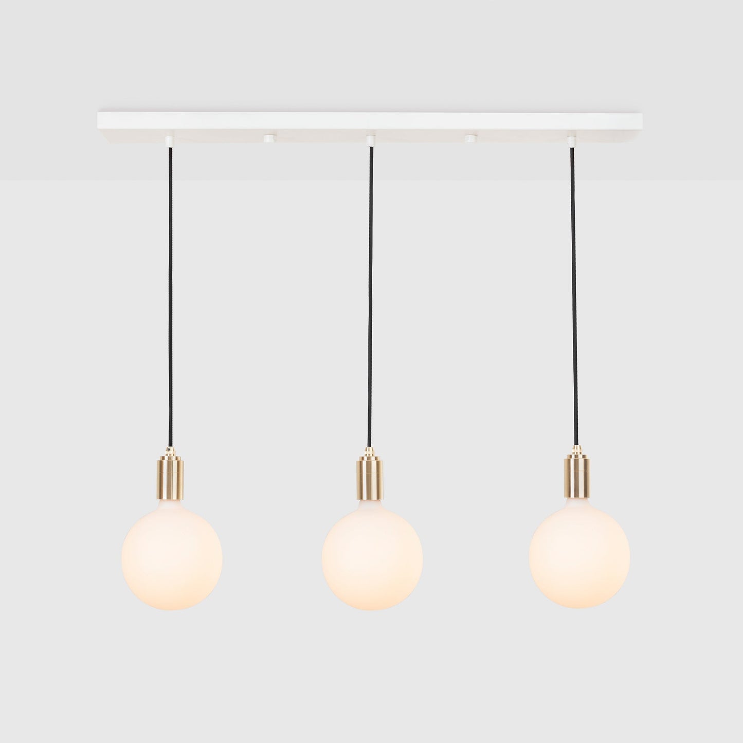 Linear Triple Pendant in Brass Tala