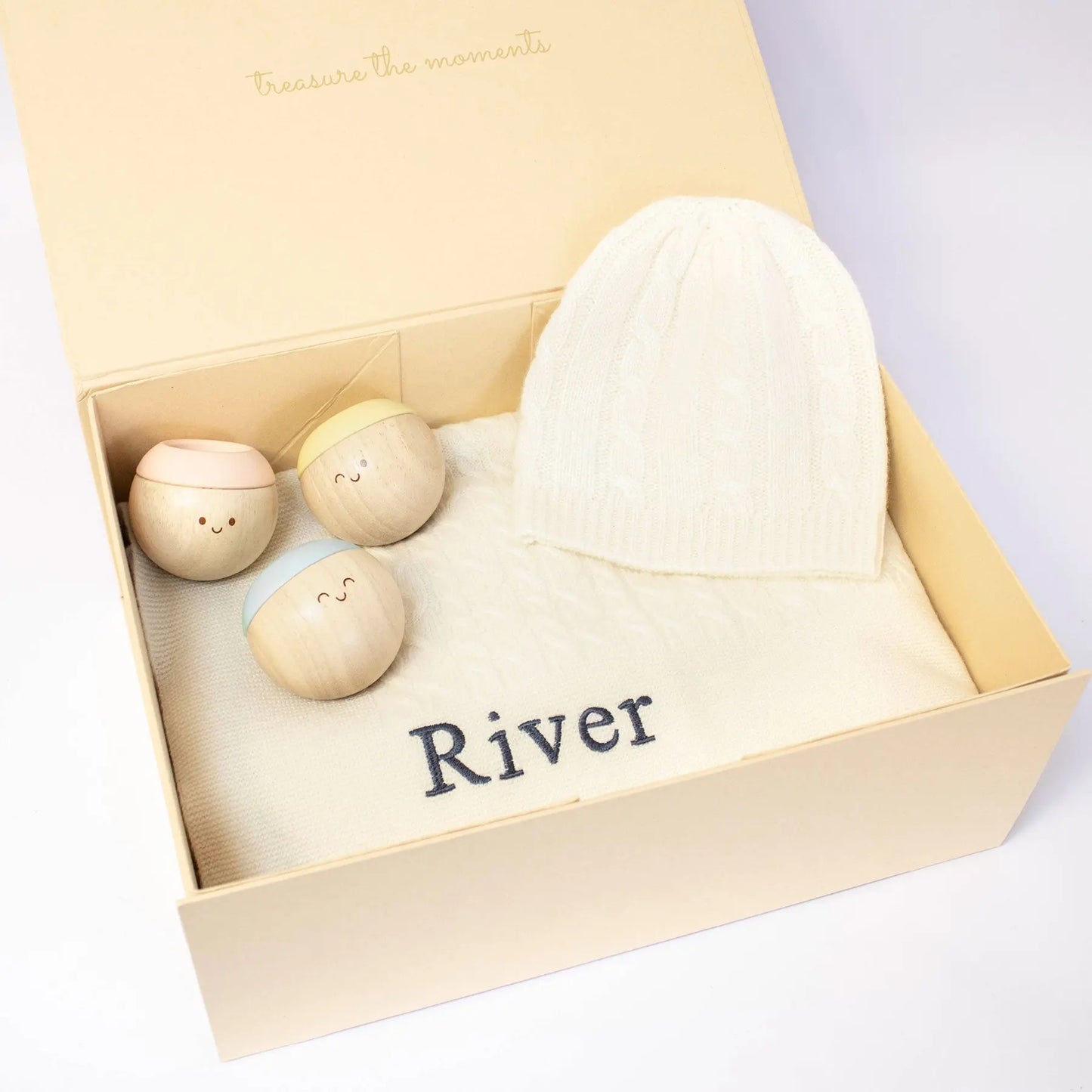 CABLE KNIT CASHMERE AND SENSORY BALLS - IVORY The Baby Gifting Company