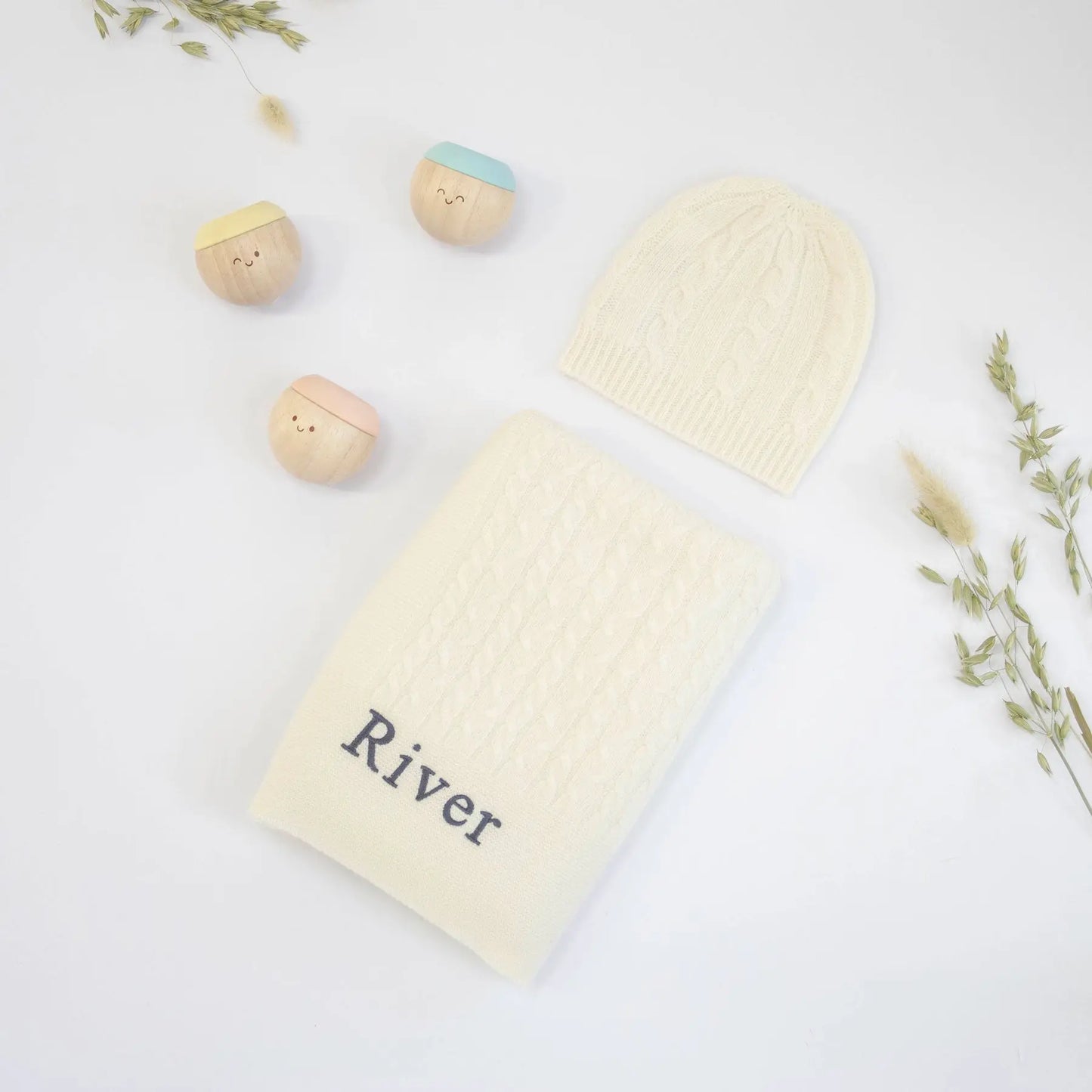 CABLE KNIT CASHMERE AND SENSORY BALLS - IVORY The Baby Gifting Company