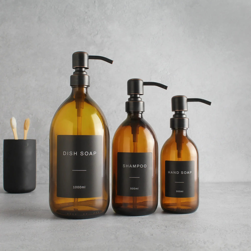 Labelled Amber Glass Dispenser Bottle With Black/Copper Pump Namie Home
