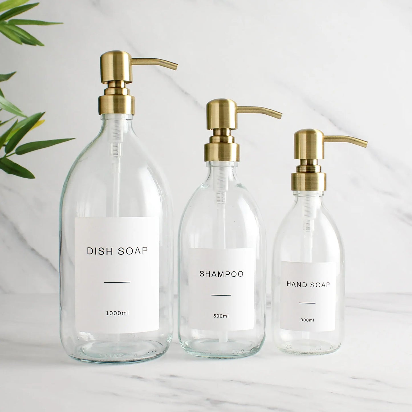 Labelled Clear Glass Dispenser Bottle With Gold Pump Namie Home