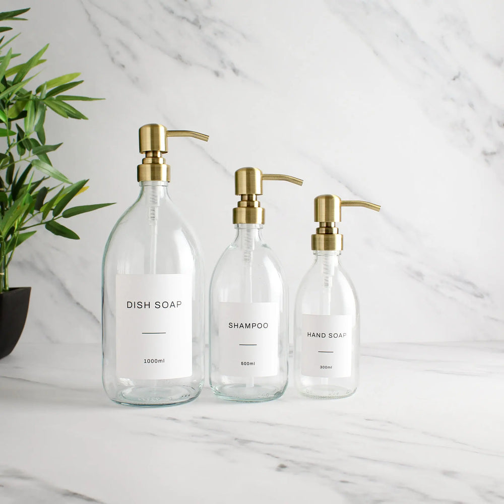 Labelled Clear Glass Dispenser Bottle With Gold Pump Namie Home