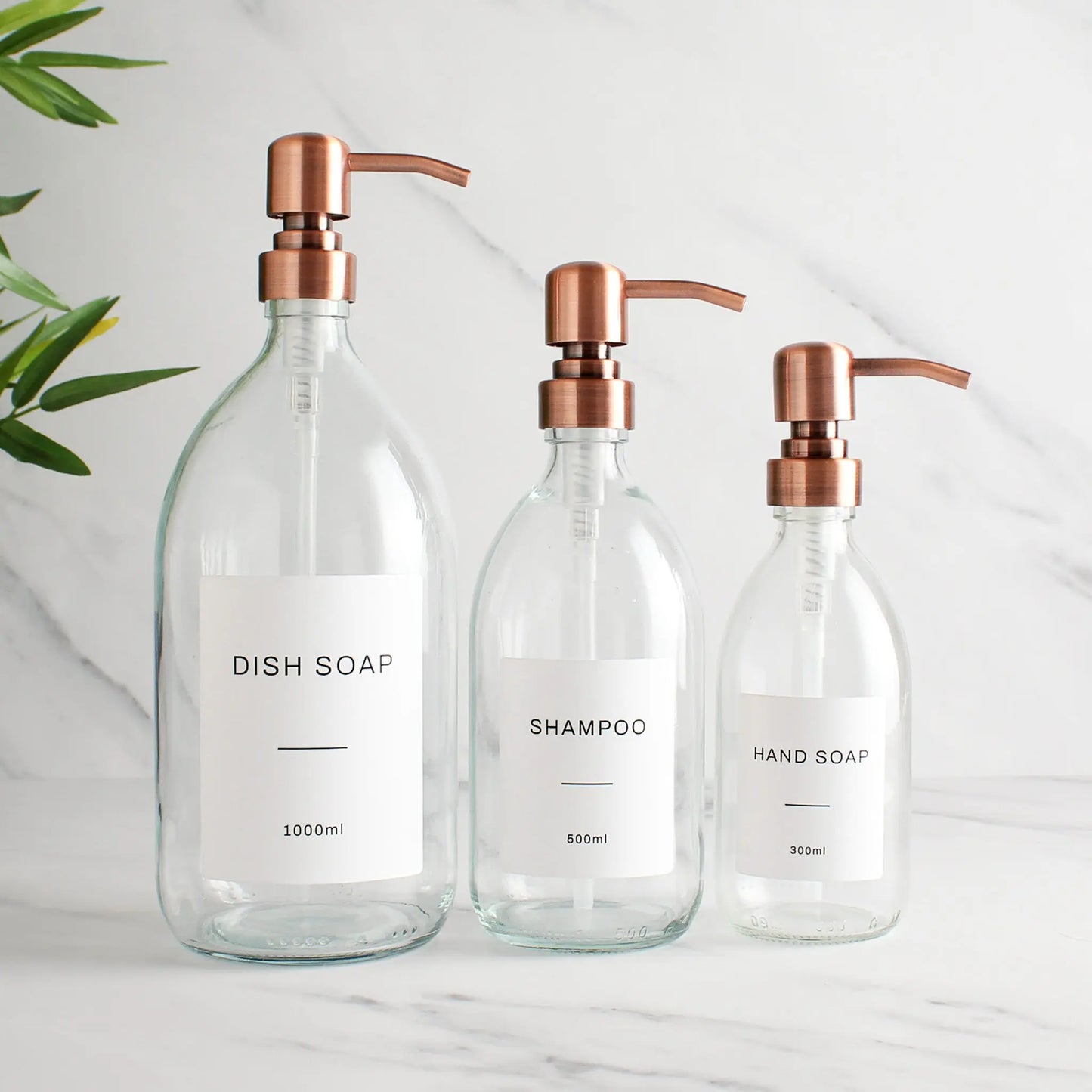Labelled Clear Glass Dispenser Bottle With Rose Gold Pump Namie Home