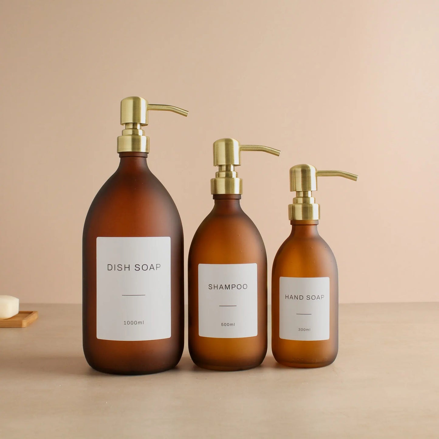 Labelled Frosted Amber Glass Dispenser Bottle With Gold Pump Namie Home
