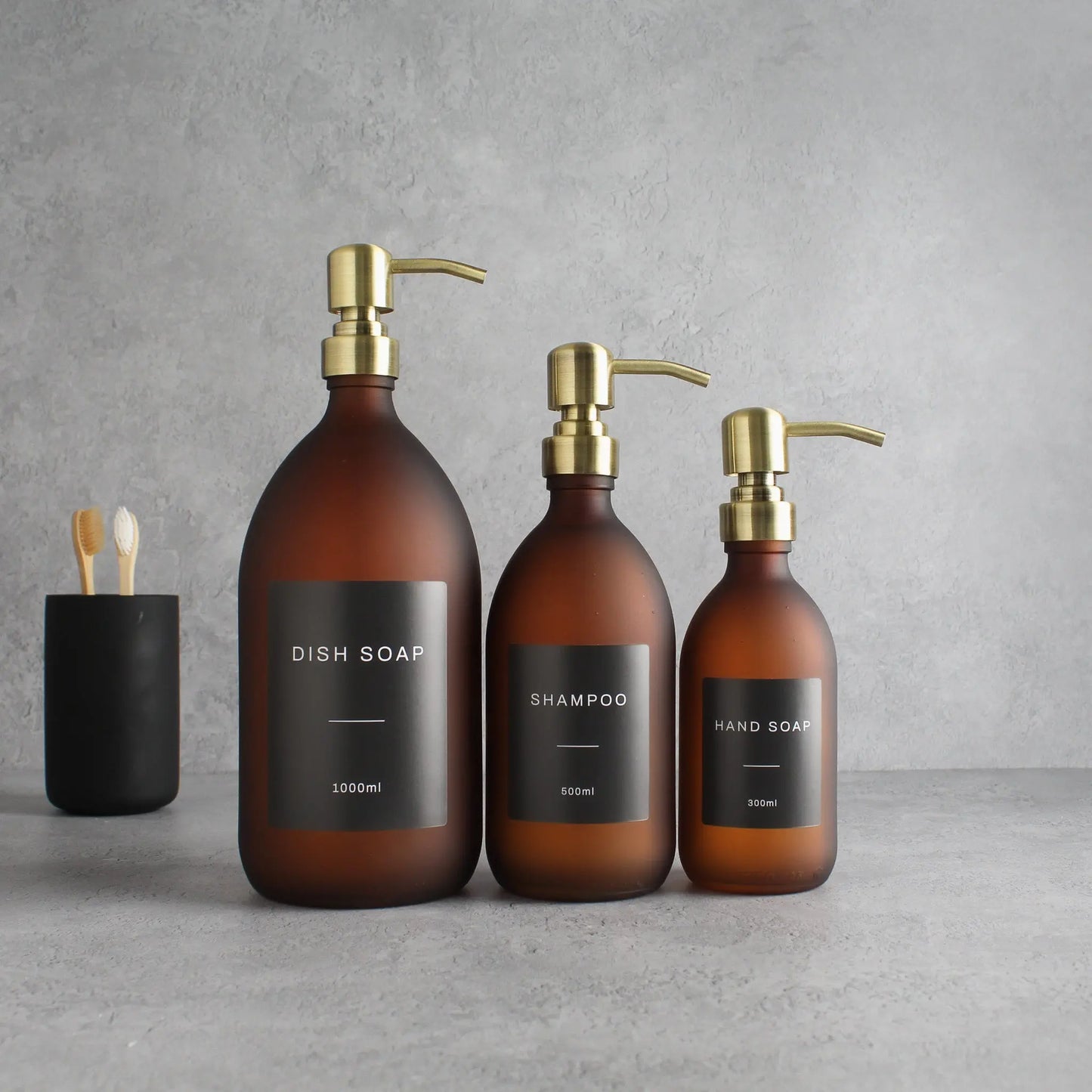 Labelled Frosted Amber Glass Dispenser Bottle With Gold Pump Namie Home
