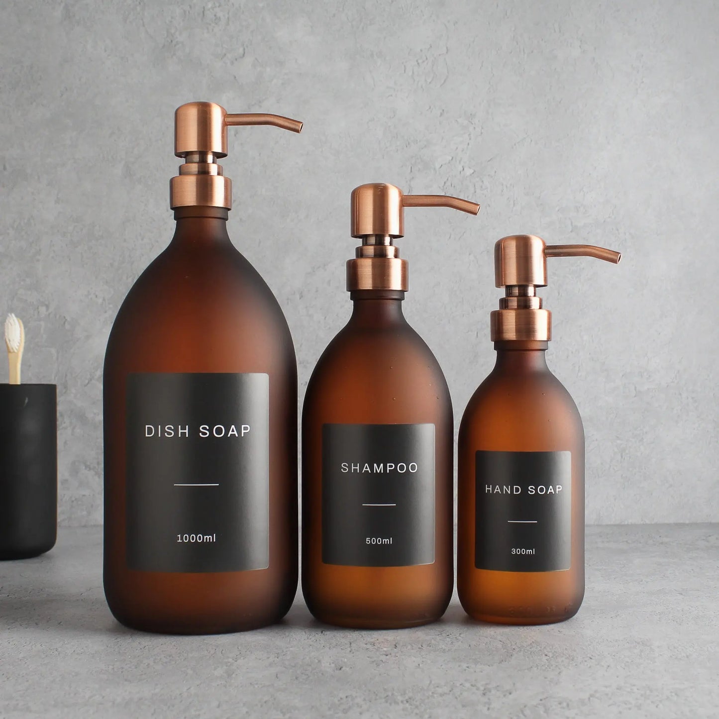 Labelled Frosted Amber Glass Dispenser Bottle With Rose Gold Pump Namie Home