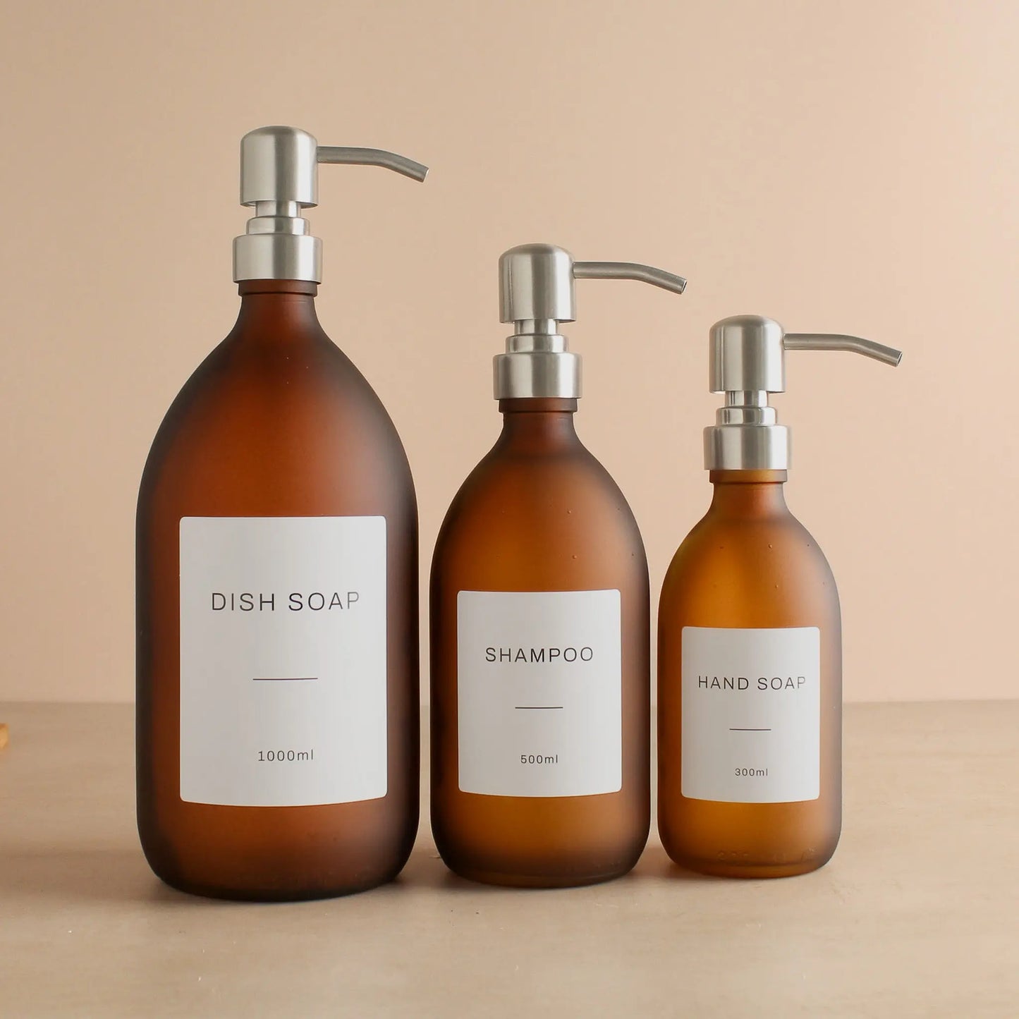 Labelled Frosted Amber Glass Dispenser Bottle With Silver Pump Namie Home