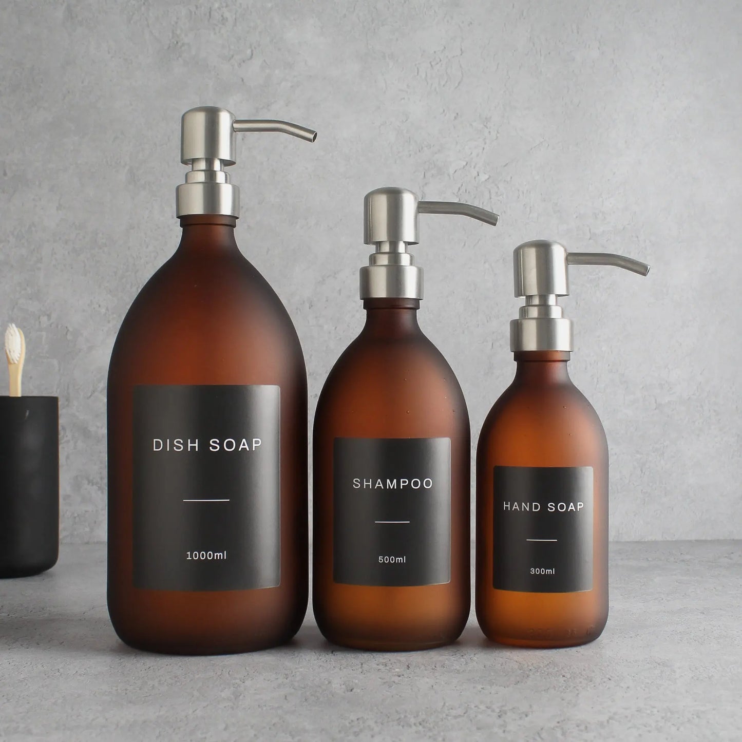 Labelled Frosted Amber Glass Dispenser Bottle With Silver Pump Namie Home
