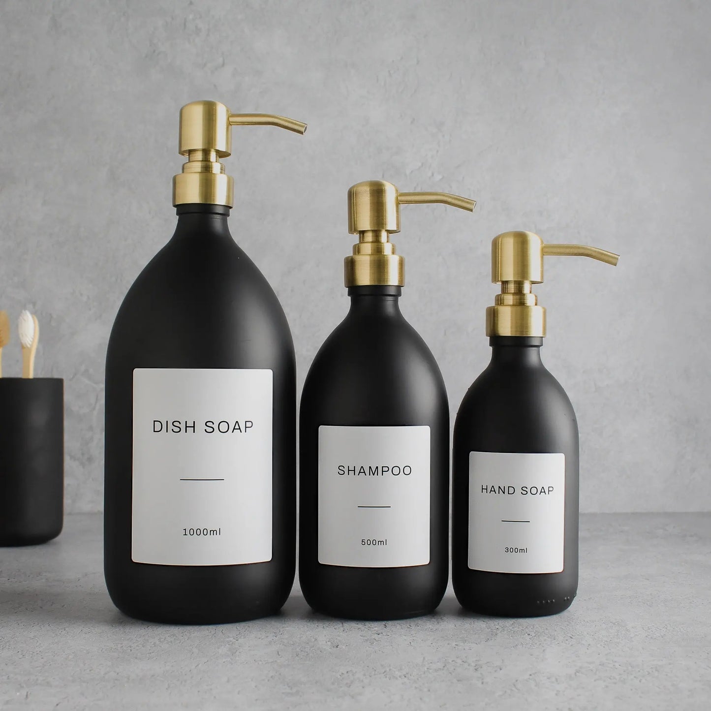 Labelled Matte Black Glass Dispenser Bottle With Gold Pump Namie Home