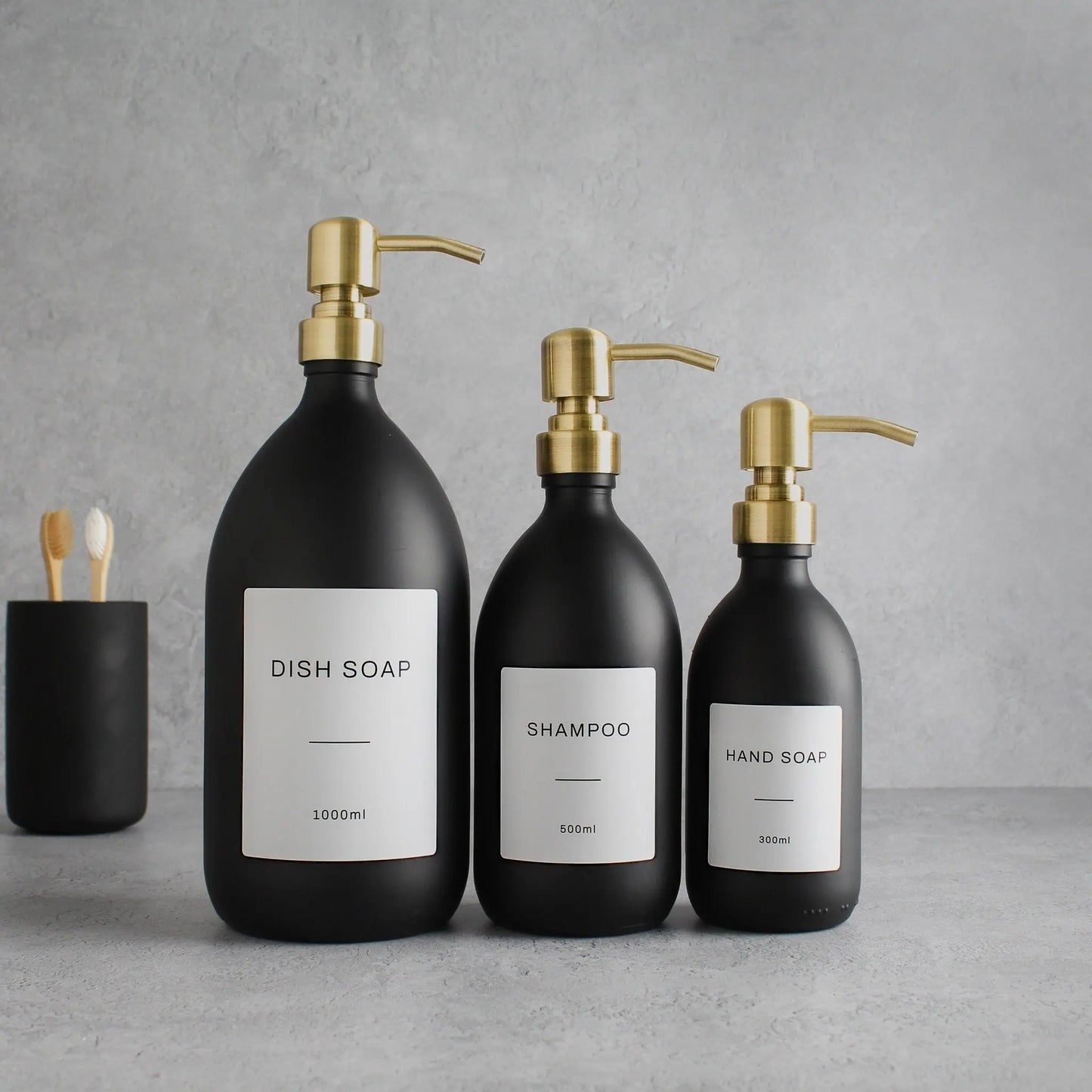 Labelled Matte Black Glass Dispenser Bottle With Gold Pump Namie Home