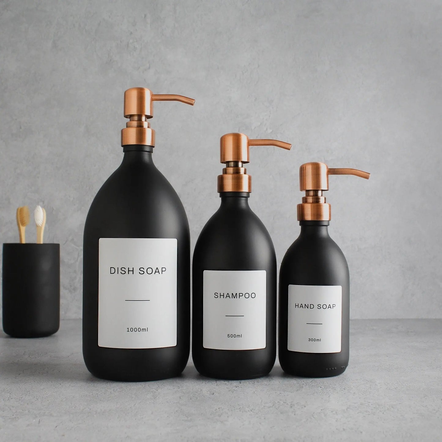 Labelled Matte Black Glass Dispenser Bottle With Rose Gold Pump Namie Home