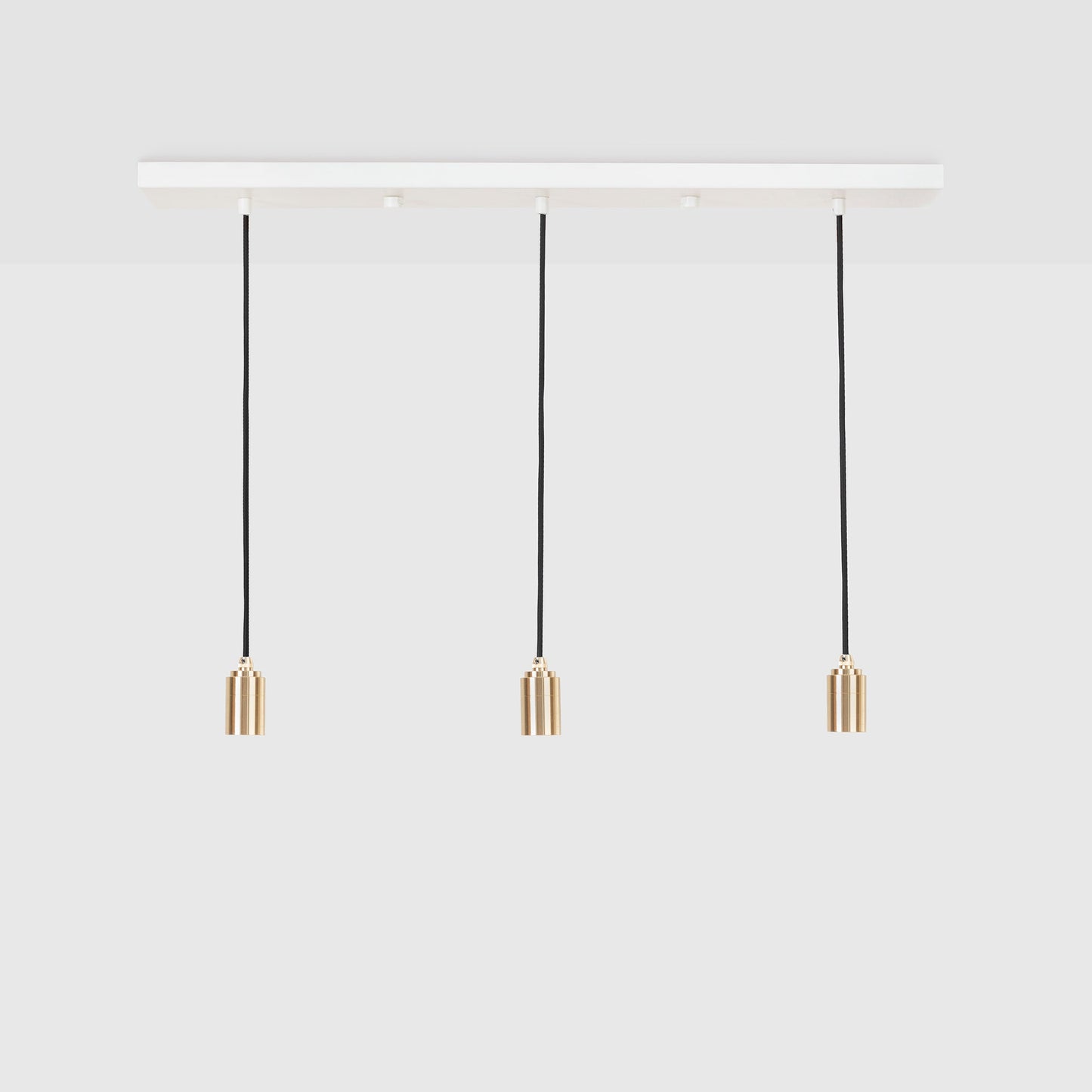 Linear Triple Pendant in Brass Tala