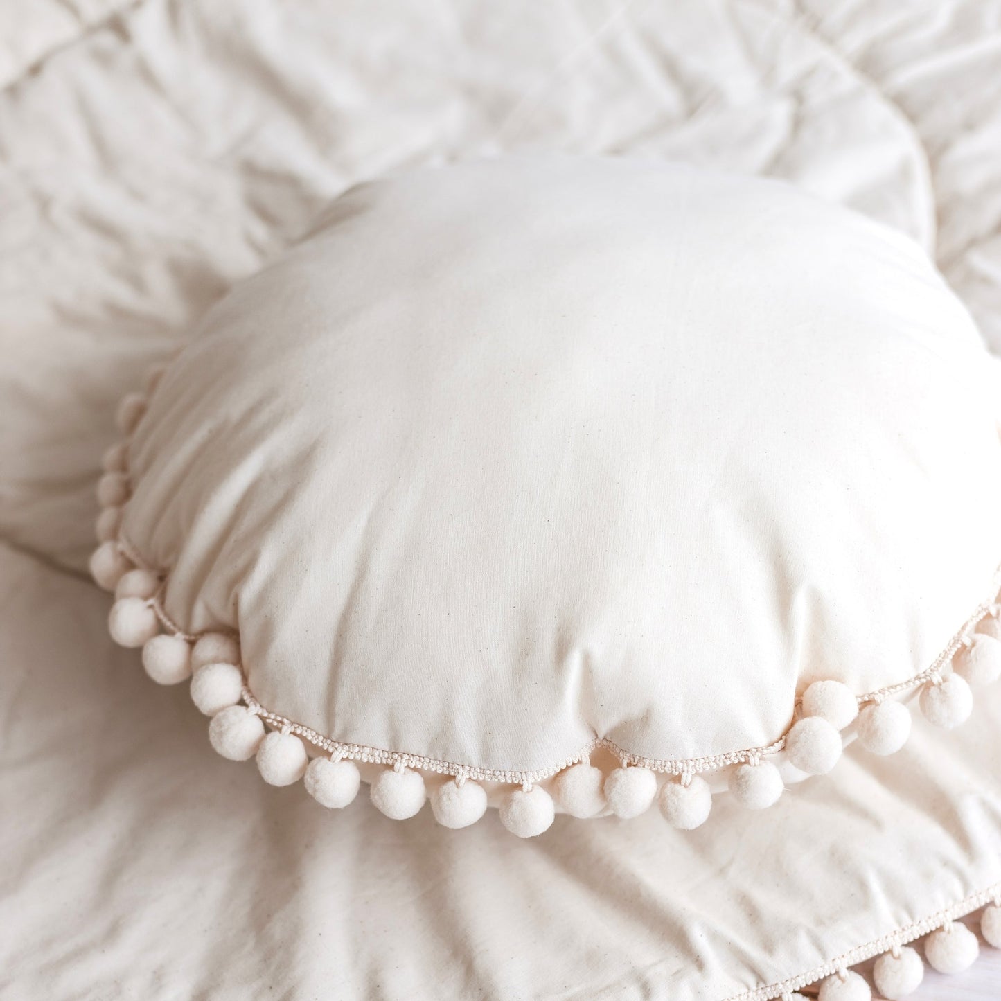 Throw Pillow in Ecru with Pompom trim MINICAMP