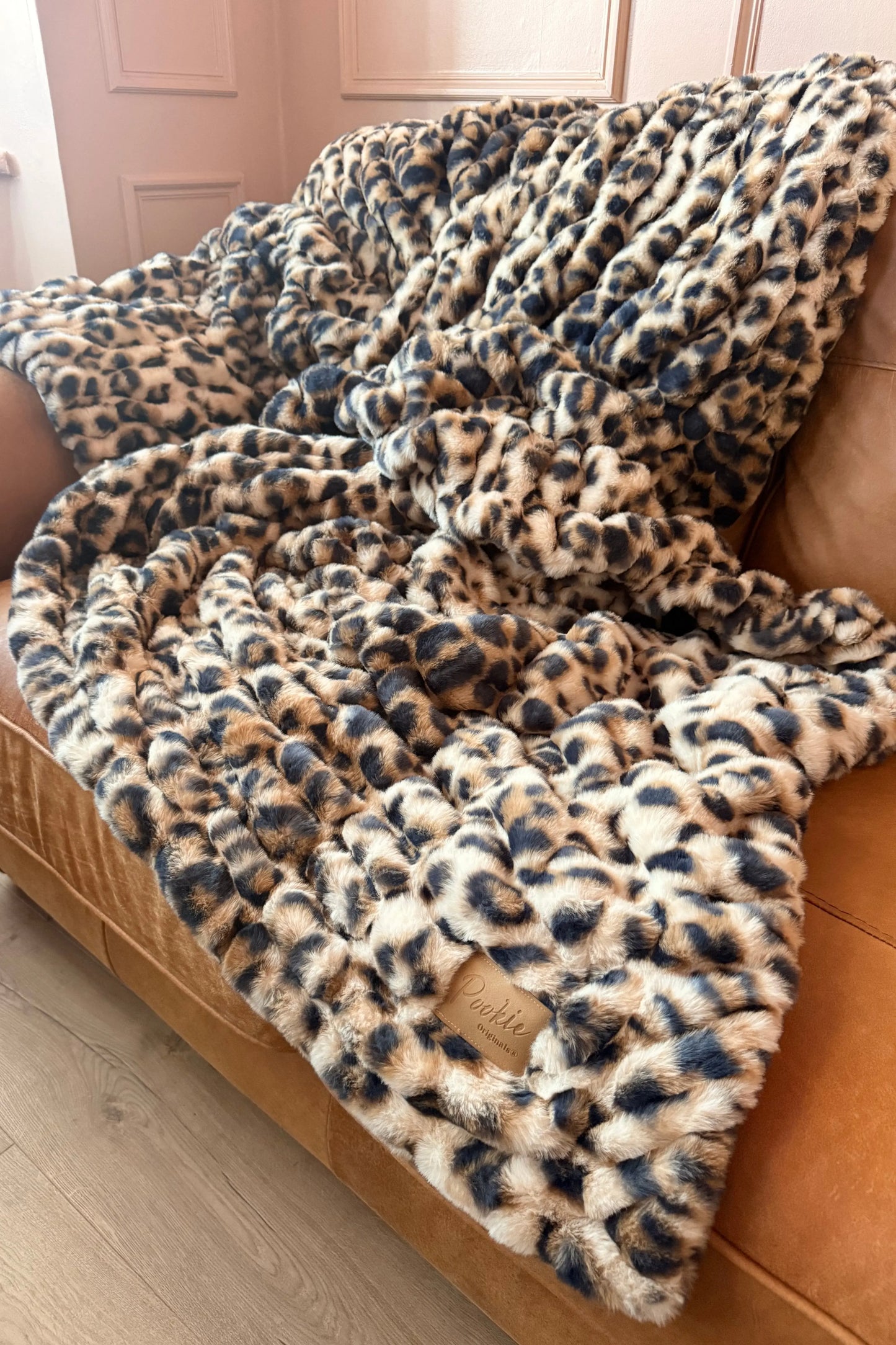 The SnuggleStretch™ Blanket in 'Dame Kat Slater' Pookie Originals®