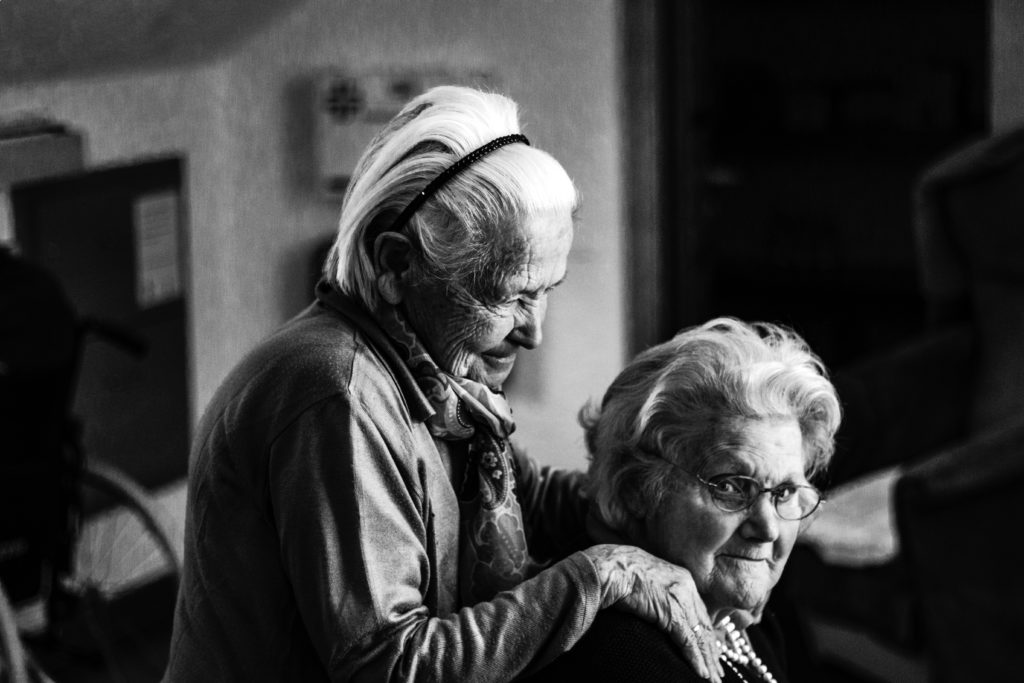 old ladies caring for each other